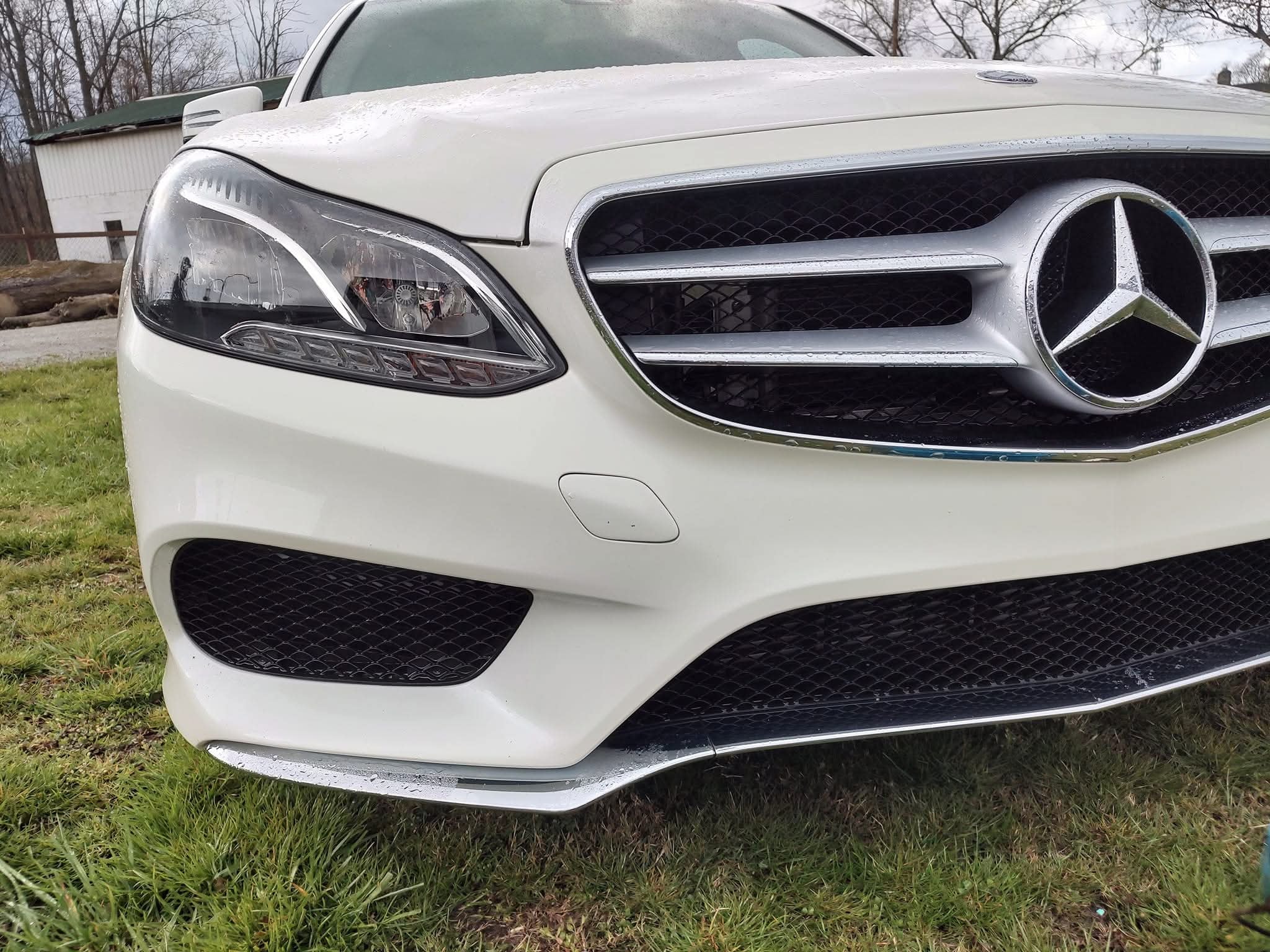 Gleaming sedan after professional exterior wash
